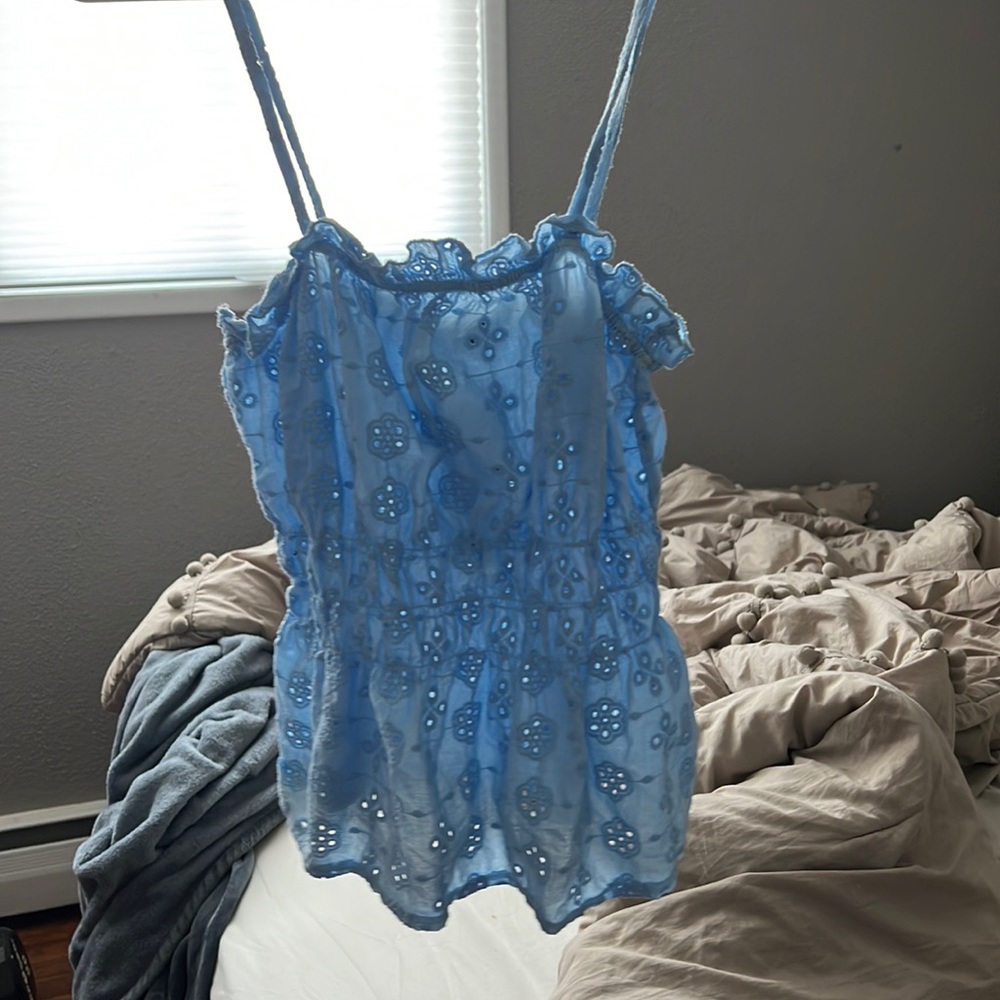 Light blue ruffled top